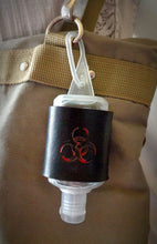 Load image into Gallery viewer, Red Biohazard Leather Hand Sanitizer Holder