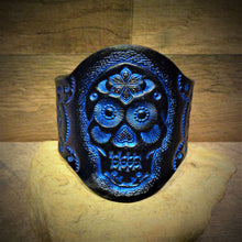 Load image into Gallery viewer, Hand Tooled Metallic Blue Sugar Skull Leather Cuff